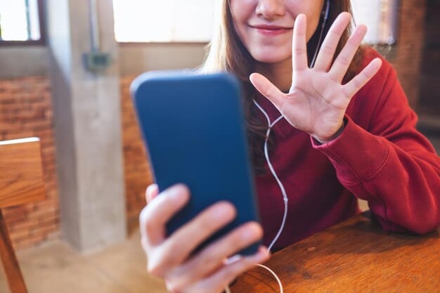 A close-up of a smartphone screen displaying a heated argument in a social media comment section. The image focuses on the emotional expressions of users in their profile pictures, highlighting the intensity and personal nature of online conflicts.