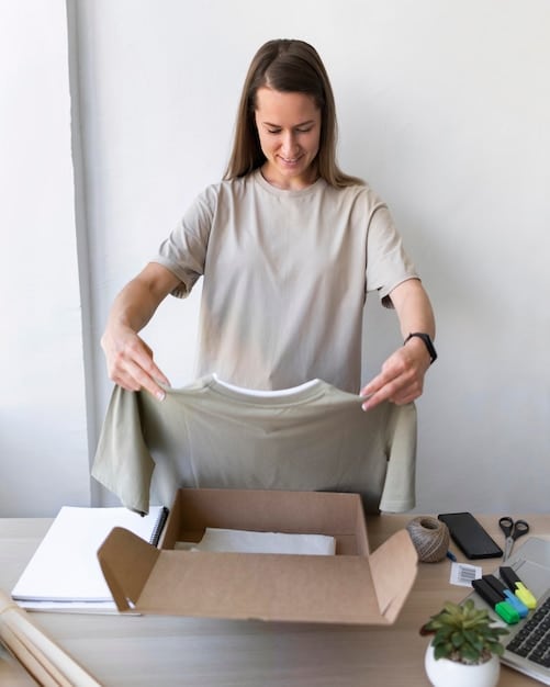 A person carefully packaging a newly acquired, limited-edition designer t-shirt in a protective sleeve, ready for shipment to a buyer, emphasizing the importance of presentation and care in the resale process.