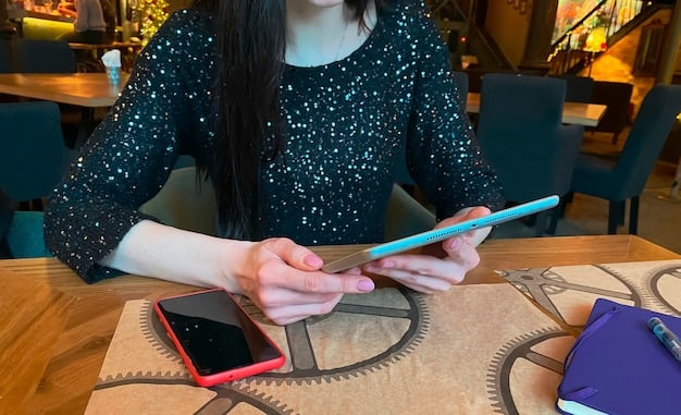 A detailed shot of a luxury fashion investor analyzing a fashion drop on a resale marketplace platform on a tablet, focusing on the pricing trends and customer reviews.