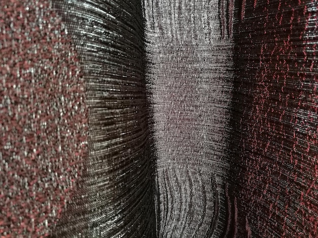 A detailed shot of various fabric swatches, showcasing different textures and weaves of high-quality materials like silk, cashmere, organic cotton, and linen. Each swatch has a label indicating its composition and origin to emphasize the importance of material transparency
