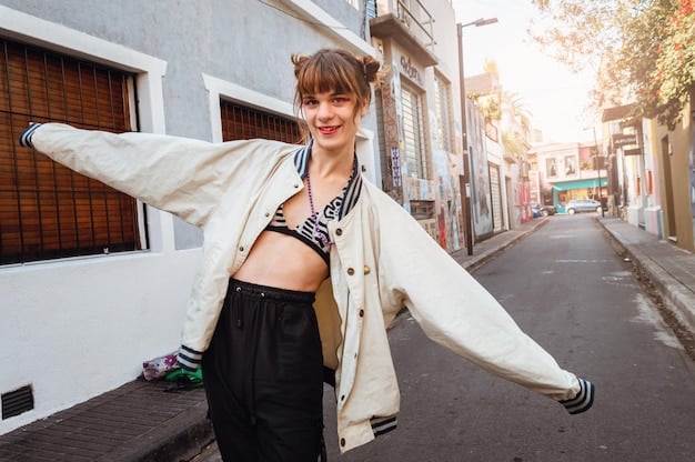 A street-style photograph of a person wearing a limited-edition fashion drop outfit that features a unique combination of textures, colors, and design elements. The outfit includes hand-painted accents, asymmetrical cuts, and upcycled materials, highlighting the originality and artistic craftsmanship of the collection